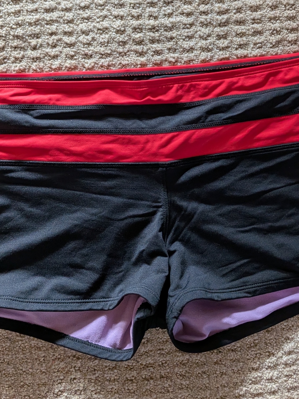 Athleta Black Shorts with Red Waistband and Purple Lining....New Without Tags